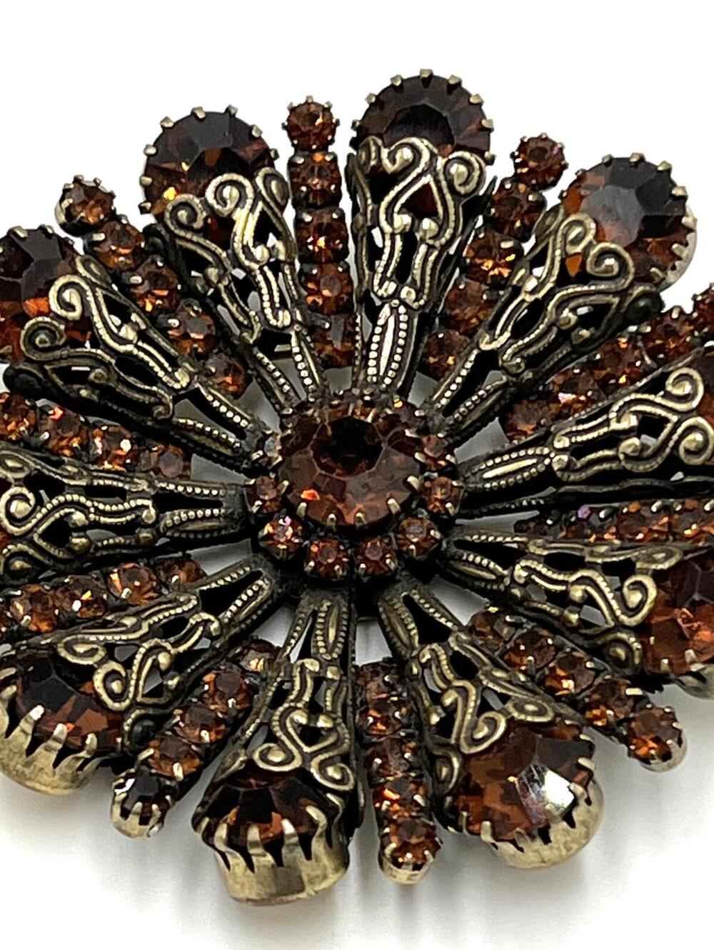 Unsigned Vendome Goldtone Copper Rhinestone Radial/Sunburst Filigree Brooch